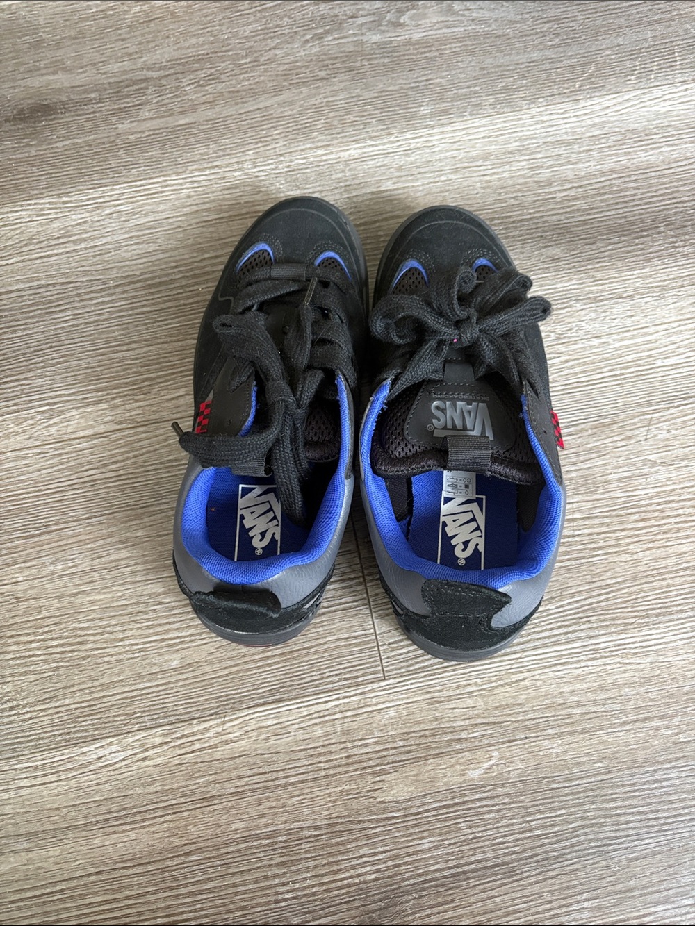 Vans Men's Black Sneakers with Blue Lining and Red Heel Detail